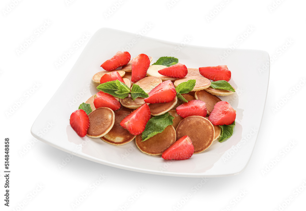 Plate with mini pancakes, strawberry and mint on white background Plate with mini pancakes, strawberry and mint on white background