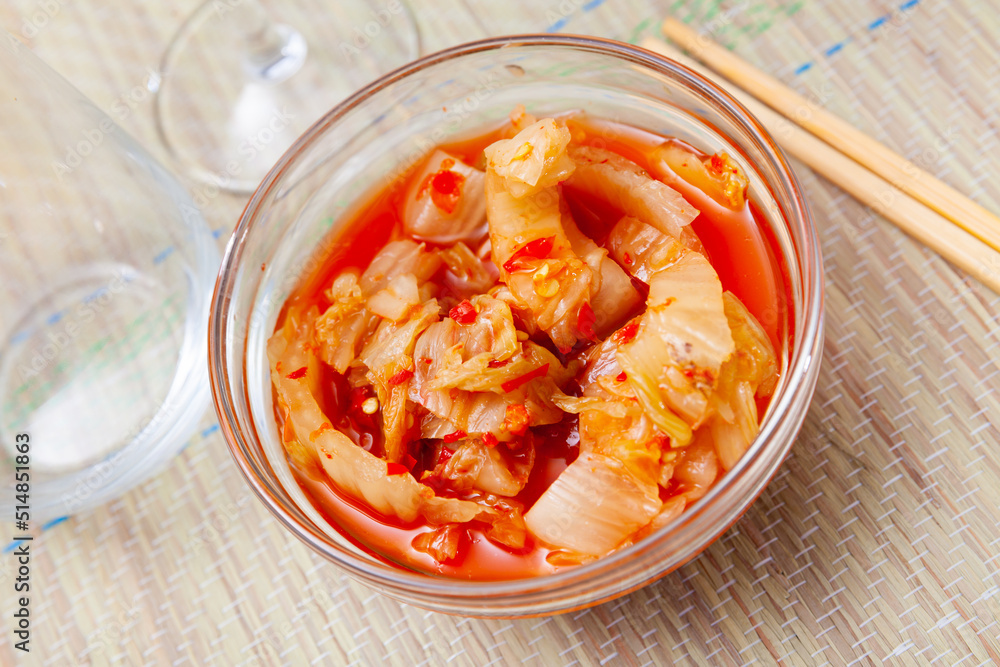 Traditional Korean side dish Kimchi of salted fermented napa cabbage seasoned with scotch