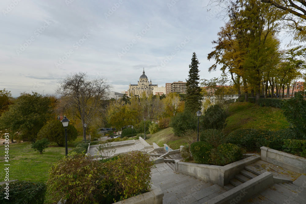 Stone staircase that goes down the Cuesta de las Vistillas with the Almudena Cathedral in the background