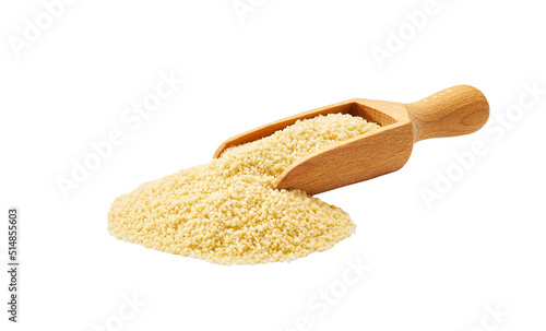 Small wooden spoon or scoop with organic couscous isolated on white background.