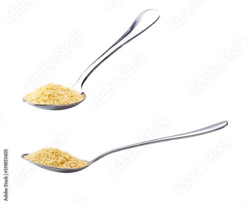 metal spoon with couscous isolated on white background.