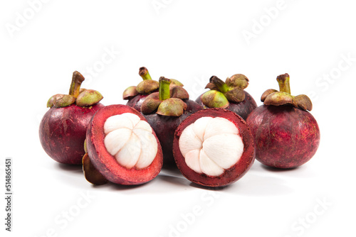 Fresh Mangosteen fruit and half mangosteen isolated on white background