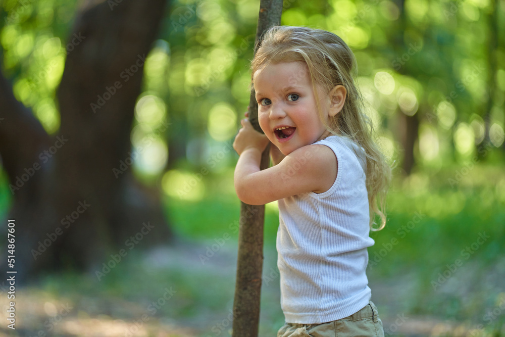 a child in the park with positive emotions a child in the park with positive emotions