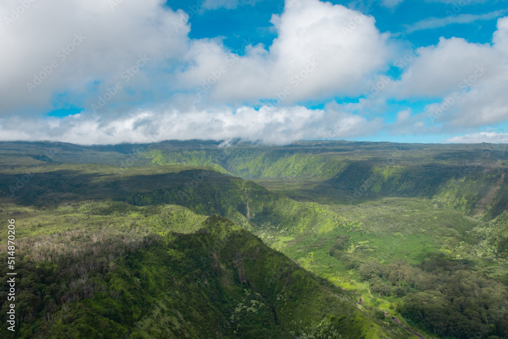 Fototapeta premium An aerial view of canyons in the Hana Rainforest on the island of Maui, Hawaii.