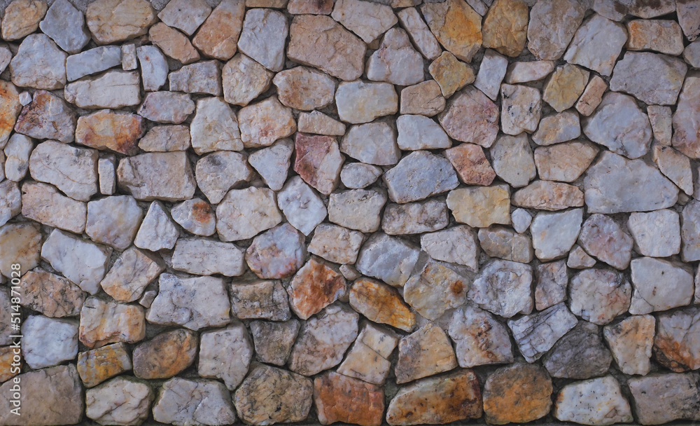 Close up colorful stone wall background.