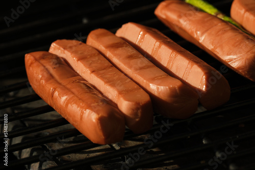 Veggie dog wieners on a barbecue grill