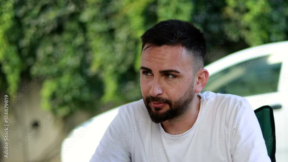 Bored and seedy thoughtful bearded young man. Man thinking about a problem Bored and seedy thoughtful bearded young man. Man thinking about a problem