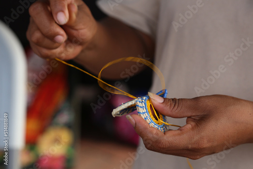 Panamanian artisan hands weaving handicrafts photo
