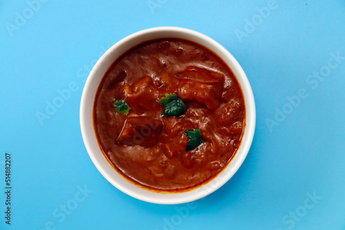 Indian chicken curry roux like tomato soup on the table