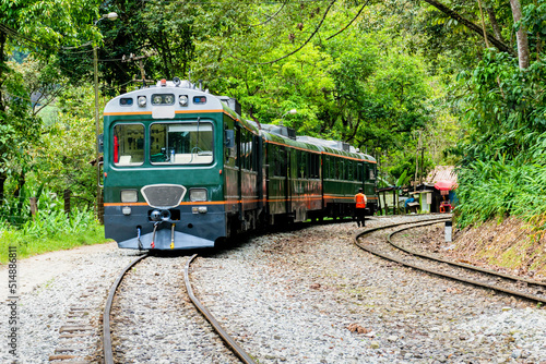train in the morning with green landscape on the railway Machupicchu Cusco Peru