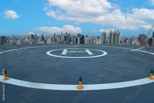 The Heli Copter parking lot on the deck with blue sky in the capital of Thailand. Space for helicopter landing on high-rise buildings in Bangkok, Thailand.