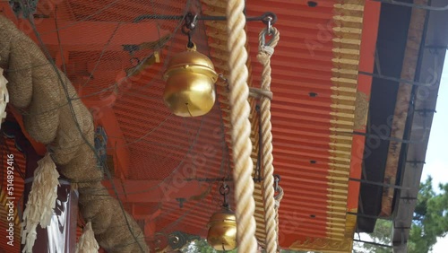 Still shot of ringing gold bell in Yasaka shrine, Kyoto Japan. photo