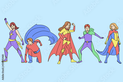 Superheroes in costumes posing