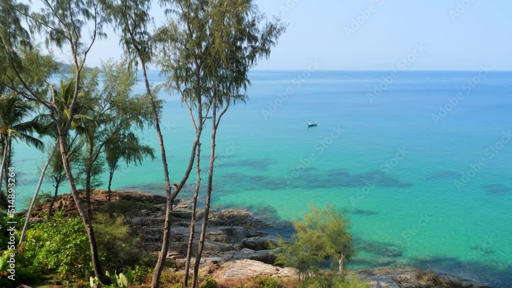 Summer island tropical vacation. Amazing view on turquoise sea with stones, trees and small boats. Dream nature trip. Relax on paradise, Thailand, Asia. Concept of exotic travel, idyllic landscape. Summer island tropical vacation. Amazing view on turquoise sea with stones, trees and small boats. Dream nature trip. Relax on paradise, Thailand, Asia. Concept of exotic travel, idyllic landscape.