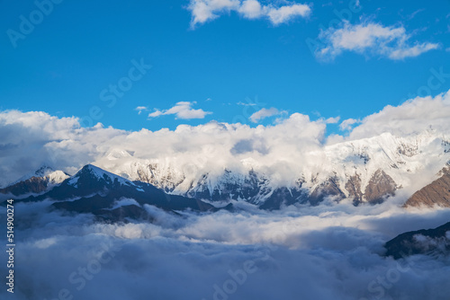 Wallpaper Mural The natural beauty of Gongga snow mountain and blue sky and white clouds in Western Sichuan, China Torontodigital.ca