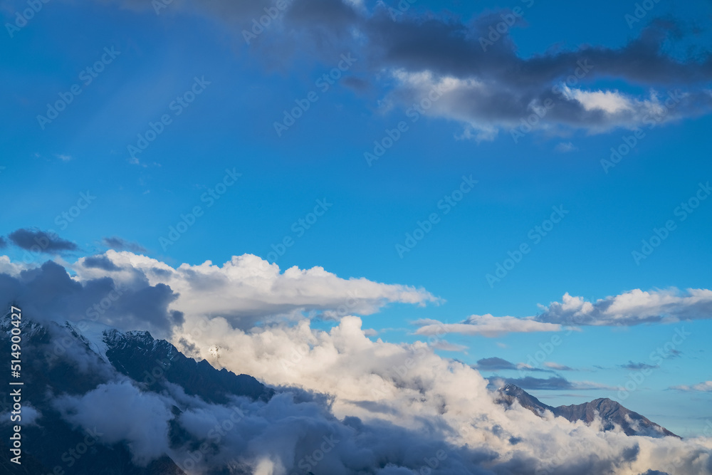 The natural beauty of Gongga snow mountain and blue sky and white clouds in Western Sichuan, China