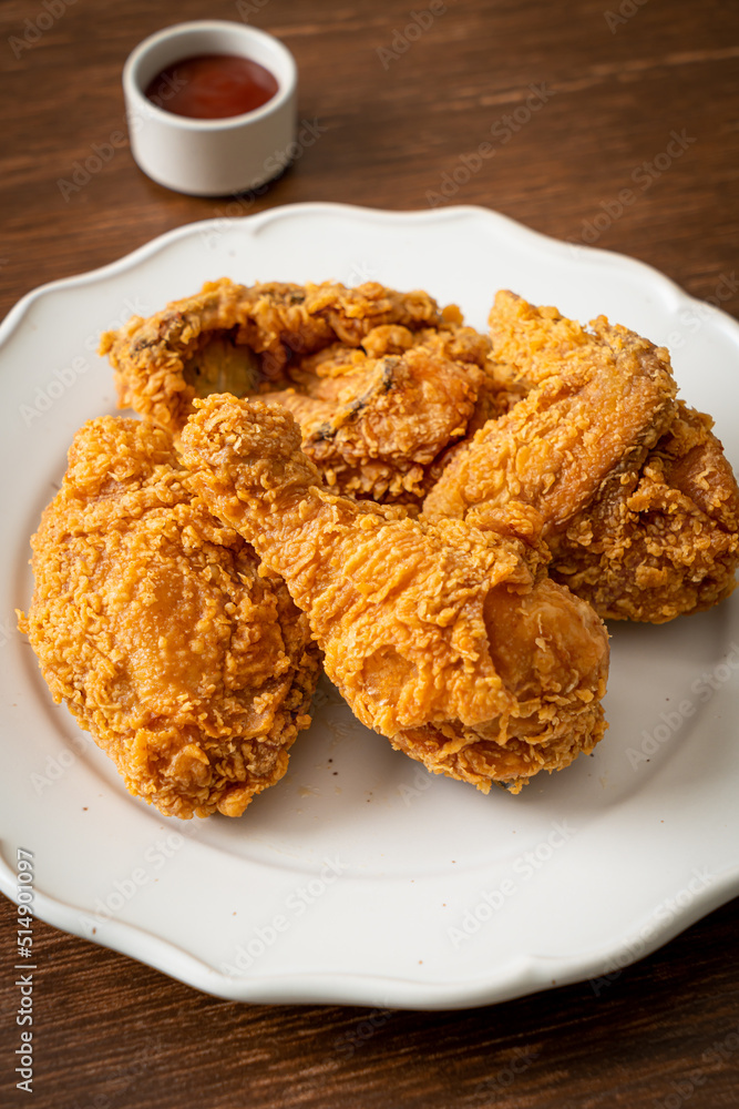 fried chicken with ketchup on plate fried chicken with ketchup on plate