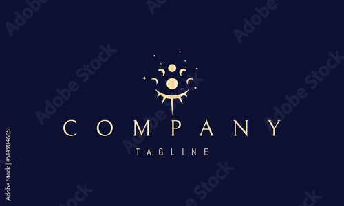 Vector golden logo on which an abstract image of the all-seeing eye composed of the phases of the moon.