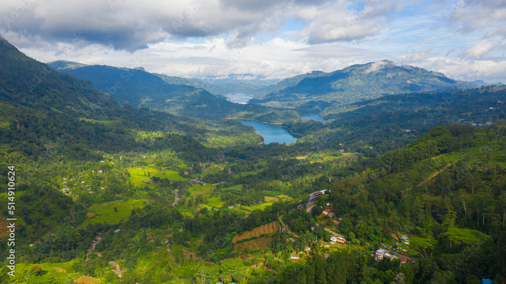 Mountain valley with the lakes among tea plantations and mountains. Kotmale Reservoir. Ramboda, Sri Lanka.