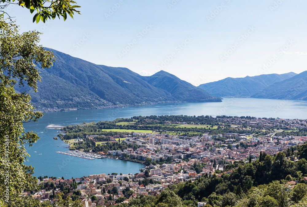 Switzerland, Ticino, Locarno, Edge of city located on northern shore of Lake Maggiore in summer Switzerland, Ticino, Locarno, Edge of city located on northern shore of Lake Maggiore in summer