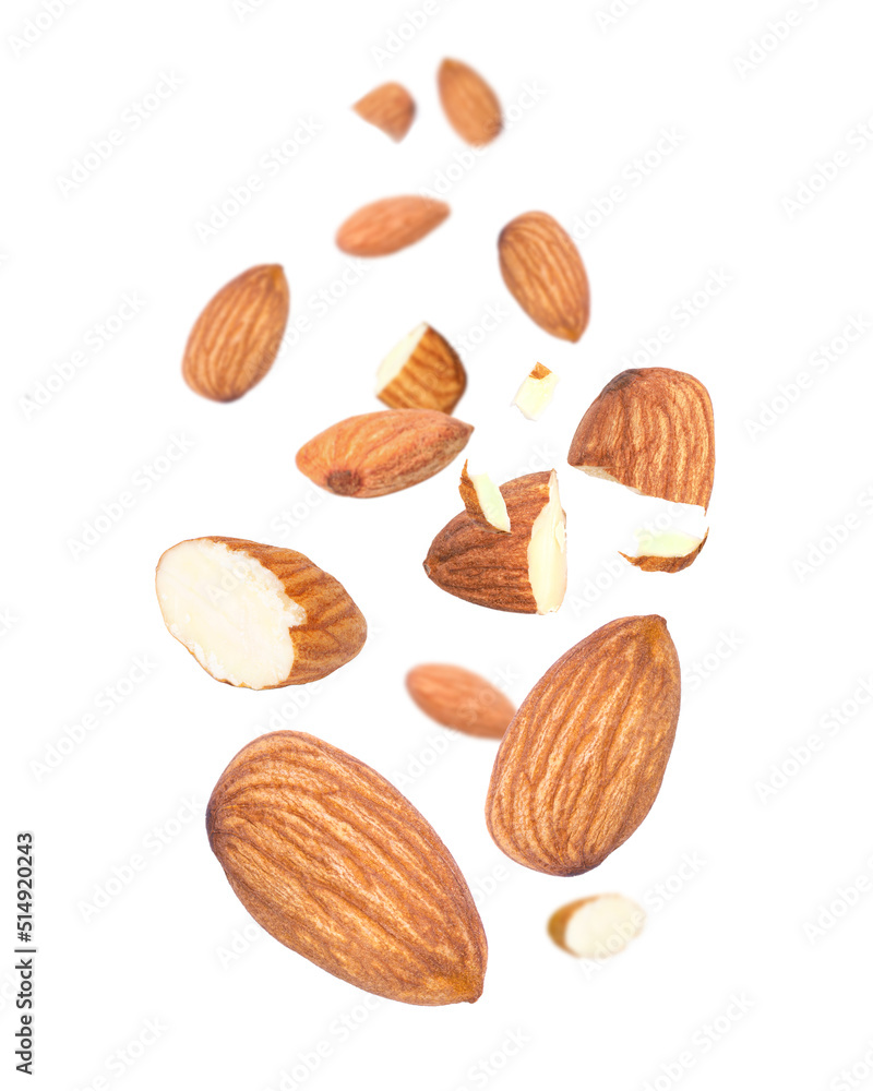 Almond nut flying in the air isolated on white background. Almond nut flying in the air isolated on white background.