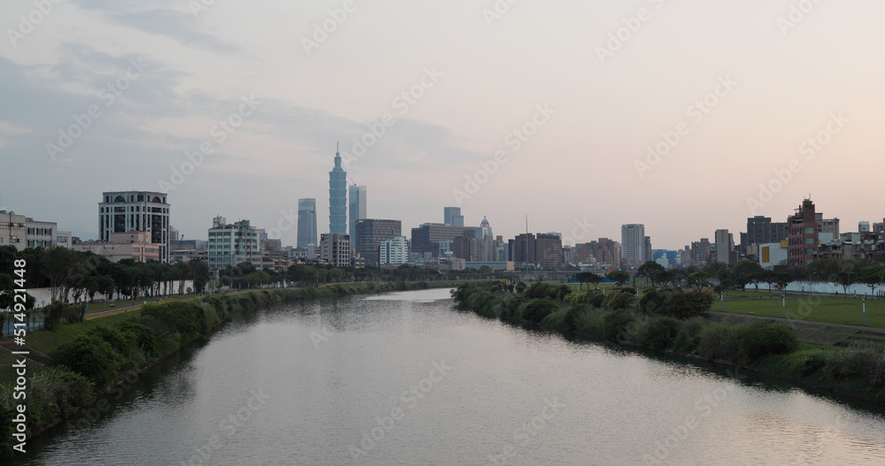Taipei city skyline with keelung river in the evening