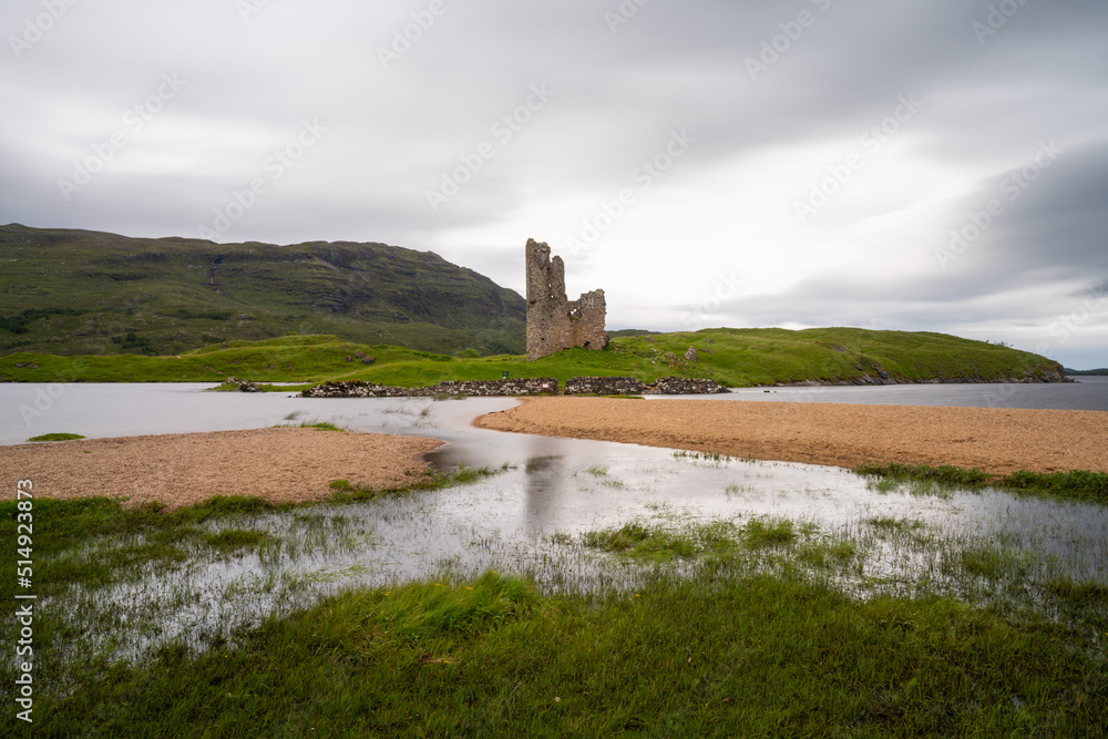 long exposure view of the Ardvreck Castle on Loch Assynt in the Scottish Highlands