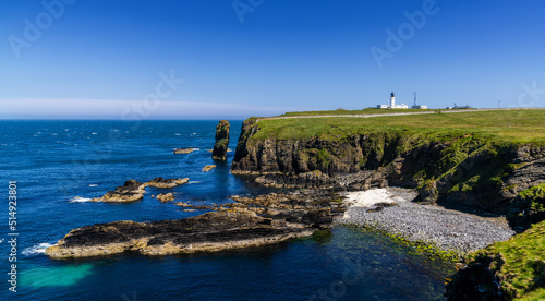 panorama view of the wild Caithness coast and the Noss Head Lighthouse photo