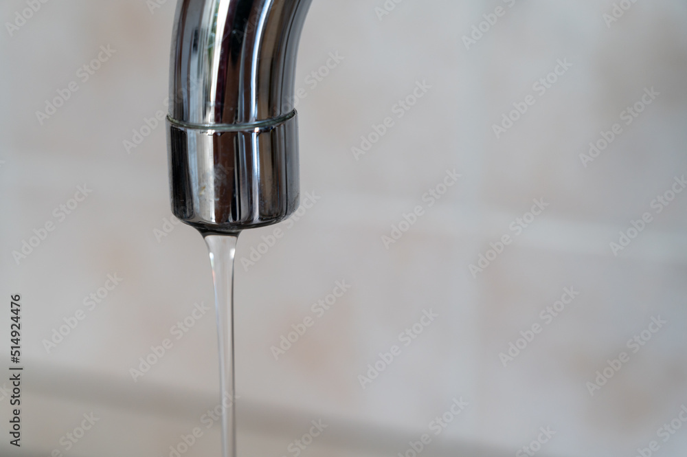 Tap from which drops of water flow. Drought, shortage, rationing and proper use of water. Tap from which drops of water flow. Drought, shortage, rationing and proper use of water.