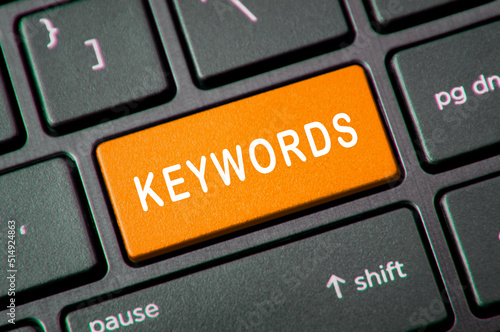 Keywords text of Laptop Keyboard Key. Online keywords seach concept photo