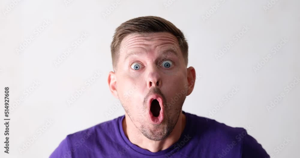 Portrait of surprised shocked man with wide open eyes Portrait of surprised shocked man with wide open eyes