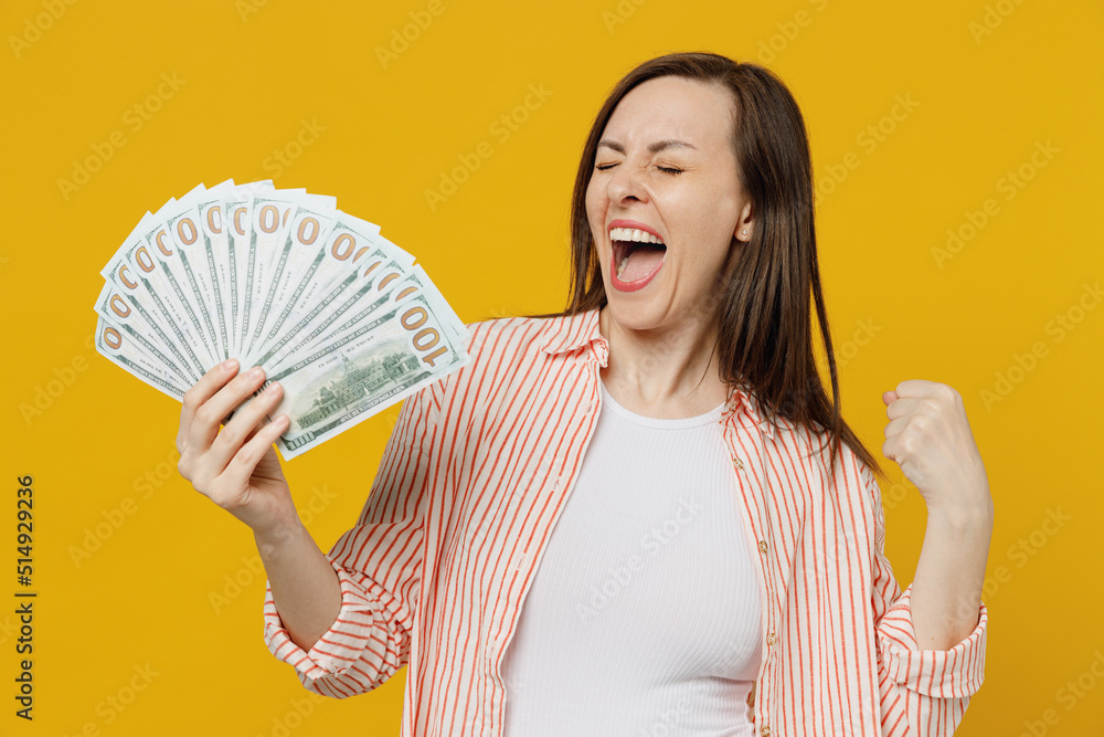 Φωτογραφία Young happy exultant overjoyed excited woman she 30s wears striped shirt white t