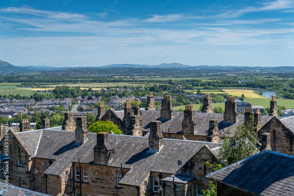 view of rooftops and stone chimneys of typical rowhouses in the old city center of Stirling