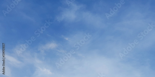  Decorative, clear and fresh morning sky background with clouds cape, Abstract blue sky background of summer season with small clouds, fluffy and blurry summer sky background for wallpaper and design.
