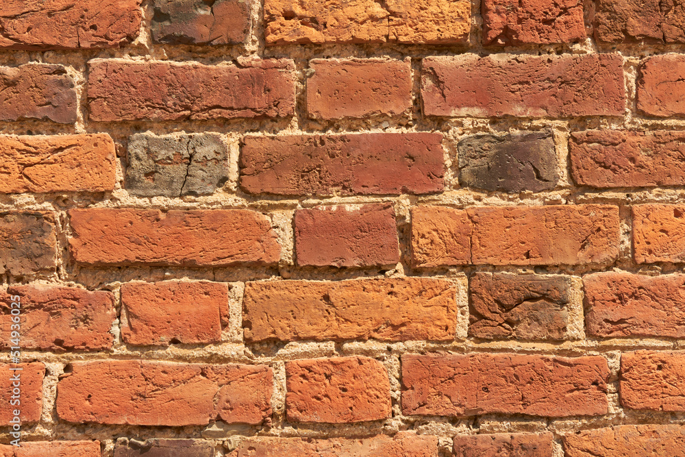 Obraz premium Ancient brickwork. Red brick background. Old red brick wall.