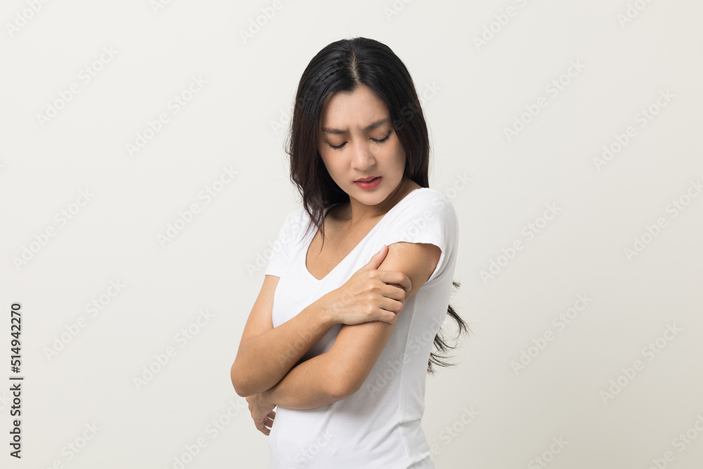 Asian women have skin problems She felt irritation on her skin. Skin infection itching red rash scratching with hands. She around 25 Wearing white shirt standing on isolate background Asian women have skin problems She felt irritation on her skin. Skin infection itching red rash scratching with hands. She around 25 Wearing white shirt standing on isolate background