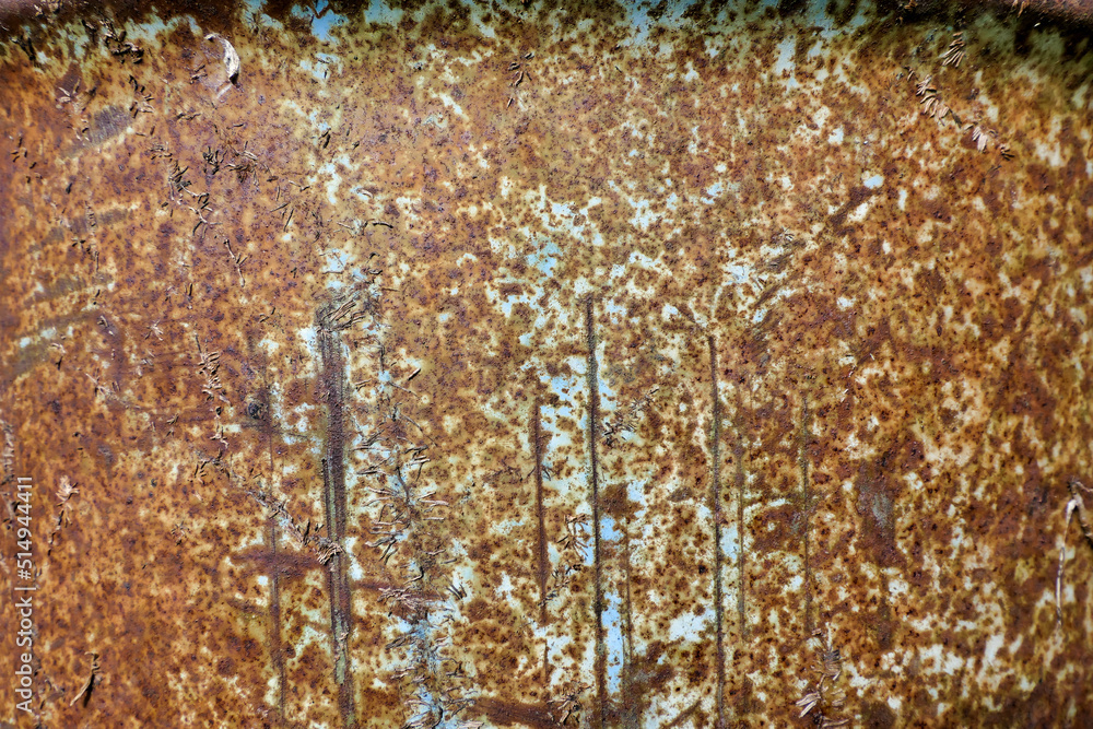 Close up of the external surface of a rusty oil barrel
Close up of the external surface of a rusty oil barrel