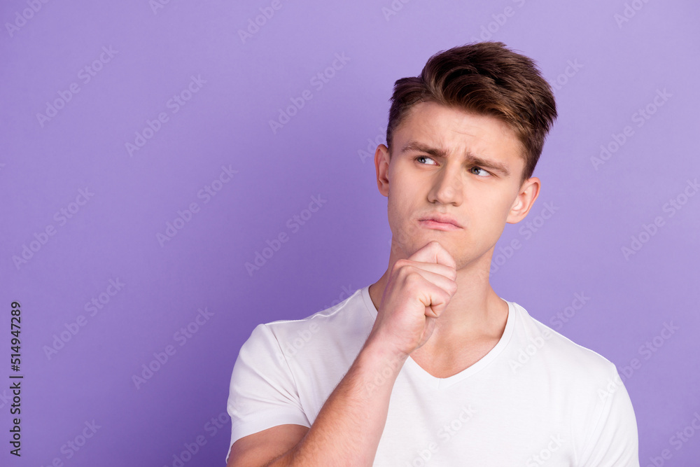 Image of handsome young man making choice thinking looking pensive up standing over vivid background Image of handsome young man making choice thinking looking pensive up standing over vivid background