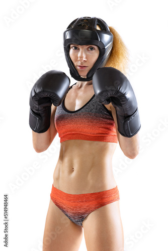 Sportive woman, female professional kickboxer in sports gloves and protective helmet posing isolated on white background. Sport, achievements concept