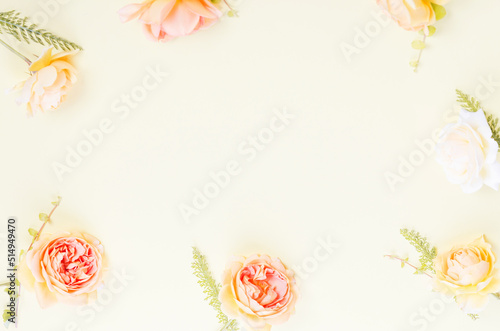 Framework from orange roses on white background.