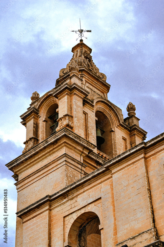 Church tower with belfry. Photo taken in Mdina or the Silent City. Malta, Europe.