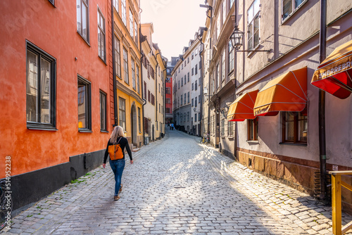 Young woman in the street of Stockholm Old Town photo