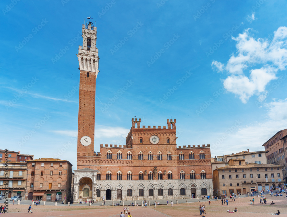 Mangia Tower in Piazza del Campo in historic city Siena, Tuscany, Italy