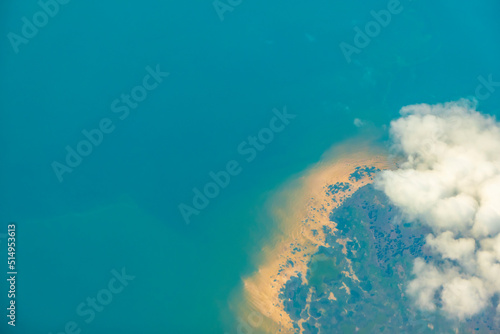 Aerial photo of Farmland. view from the plane to the ground. golden sandy beach