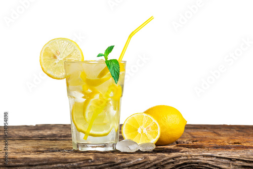 Natural lemonade with mint and fresh fruit on wooden table isolated on white background.