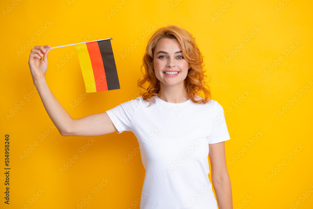 Germany school or university concept. Happy woman holding flag of Germany, immigration and travelling in Europe. Germany flag, cheering democratic laws, human rights freedoms in Germany.