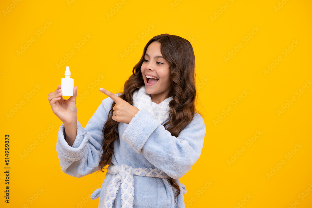Sick teen girl with nasal spray on yellow background. Amazed teen girl. Excited expression, cheerful and glad. Sick teen girl with nasal spray on yellow background. Amazed teen girl. Excited expression, cheerful and glad.