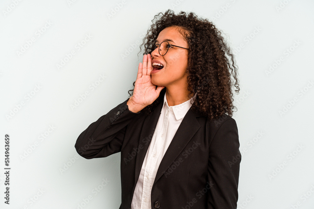 Young business Brazilian woman isolated on white background shouting and holding palm near opened mouth. Young business Brazilian woman isolated on white background shouting and holding palm near opened mouth.