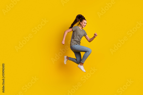 Full length body size photo of jumping high female student overjoyed isolated on bright shine color background