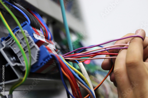 Close-up of a technician's hands.